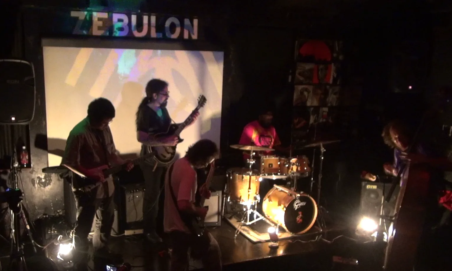 A performer on stage at Zebulon Cafe Concert.